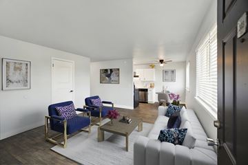 Kent apartment for rent - A living room with a white couch and a coffee table.