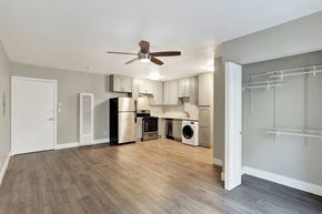 Los Angeles apartment for rent - A kitchen with a refrigerator, dishwasher, and washing machine.at Federal Apartments, Los Angeles, CA 90025