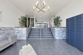 Los Angeles apartment for rent - A large, open space with a staircase leading to a second floor. at Chateau La Fayette, Los Angeles, CA, 90057