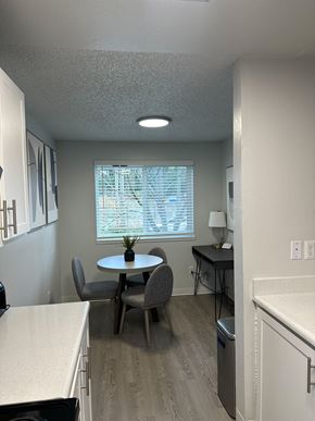 Seattle apartment for rent - A kitchen with a table and chairs.