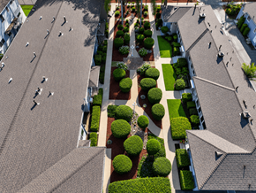 Van Nuys apartment for rent - A bird's eye view of a residential area with houses and well-manicured gardens.