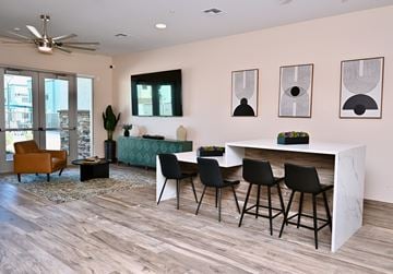 Camp Verde apartment for rent - A living room with a white table and black chairs.