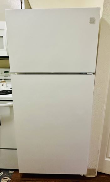Refrigerator in kitchen