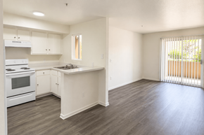 Chandler apartment for rent - A kitchen with white appliances and cabinets.