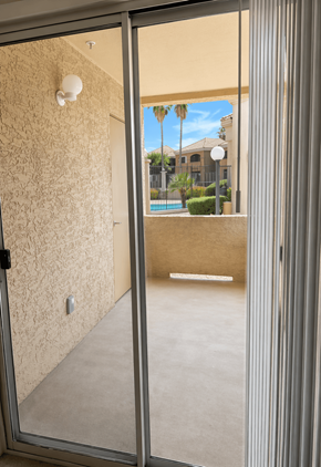 Chandler apartment for rent - A glass door with a wall on the other side.