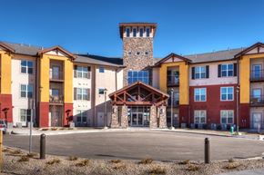 Castle Rock apartment for rent - A large building with a tower in the middle of it.