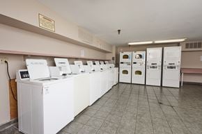 Los Angeles apartment for rent - A row of washing machines in a laundromat.