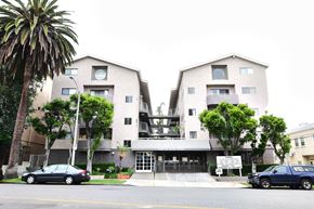 Los Angeles apartment for rent - A building with a sign that says "Residential" in front of it.