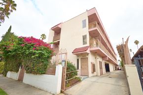 Los Angeles apartment for rent - A building with a red roof and a sign that says "LACO".
