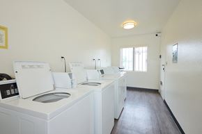 Van Nuys apartment for rent - A laundry room with a washer and dryer.