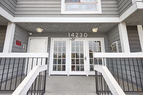 Van Nuys apartment for rent - The front door of a building with the number 14230 on it.