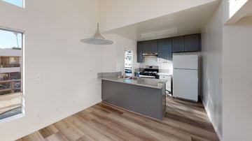 Los Angeles apartment for rent - a kitchen with a counter top and a refrigerator