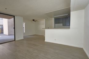 Los Angeles apartment for rent - A room with a ceiling fan and a window.