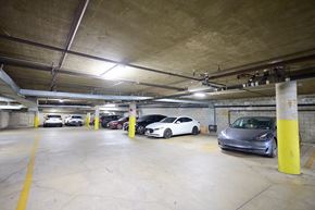 Los Angeles apartment for rent - A parking garage with several cars parked in it.