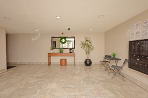 Los Angeles apartment for rent - A room with a table, chairs, and plants.