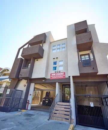 Los Angeles apartment for rent - A building with a sign that says 9091 is shown.