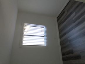 Los Angeles apartment for rent - a window in the corner of a room with white walls