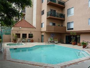 Los Angeles apartment for rent - a swimming pool in front of an apartment building