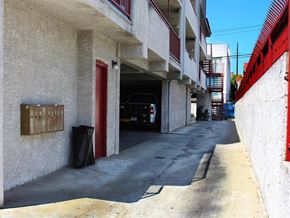 Los Angeles apartment for rent - a truck is parked in the garage of a building