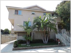 Los Angeles apartment for rent - a house with palm trees in front of it