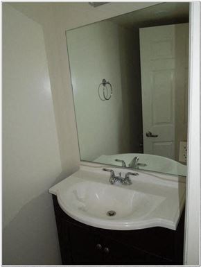 Los Angeles apartment for rent - a bathroom with a white sink and a mirror