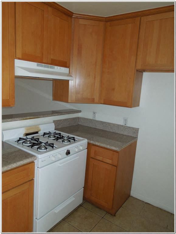 Los Angeles apartment for rent - a small kitchen with a stove and a microwave