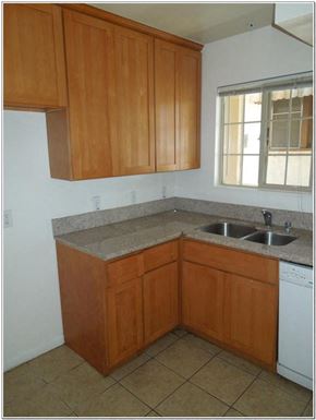 Los Angeles apartment for rent - a kitchen with a sink and cabinets and a window
