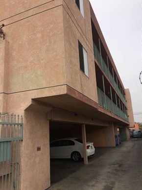 Los Angeles apartment for rent - a building with a car parked under it