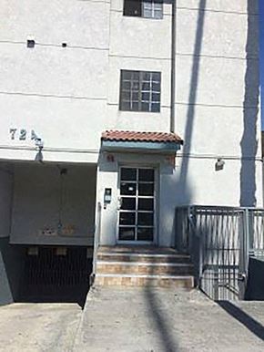 Los Angeles apartment for rent - a white building with a door and stairs