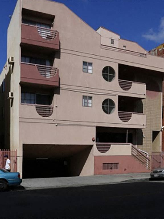 Los Angeles apartment for rent - a building with a blue car parked in front of it