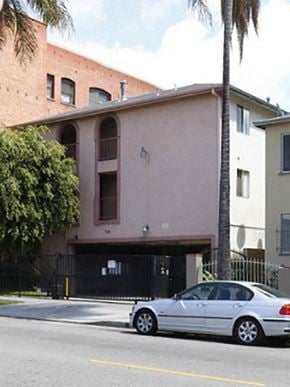 Los Angeles apartment for rent - a white car parked in front of a building