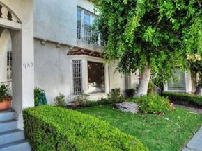 Los Angeles apartment for rent - the front of a house with a yard and a tree