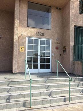 Venice apartment for rent - a building with a glass door and stairs