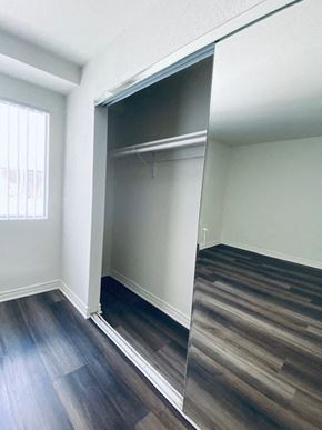 Los Angeles apartment for rent - an empty bedroom with a sliding glass closet door