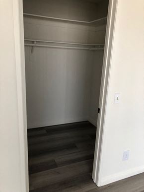 Los Angeles apartment for rent - a room with a closet and a wood floor