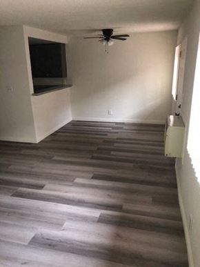 Los Angeles apartment for rent - a living room with a wood floor and a ceiling fan