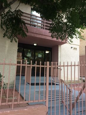 Los Angeles apartment for rent - a porch in front of a building with a fence