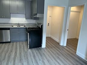 Los Angeles apartment for rent - an empty kitchen with a stove and a sink