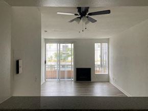 Los Angeles apartment for rent - an empty living room with a ceiling fan