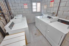 Los Angeles apartment for rent - A room with two washing machines and a window.