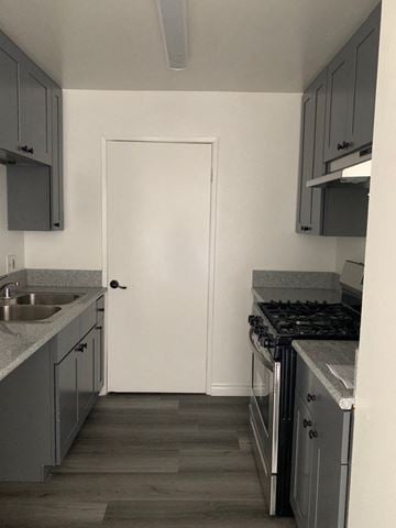 Los Angeles apartment for rent - a small kitchen with a stove and a sink