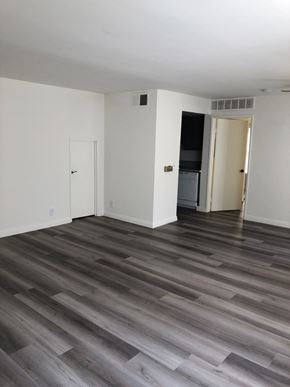 Los Angeles apartment for rent - an empty living room with white walls and wood floors