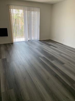Los Angeles apartment for rent - a living room with a wood floor and a sliding glass door