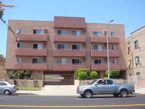 Los Angeles apartment for rent - a truck parked in front of an apartment building