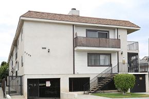 Los Angeles apartment for rent - a white house with a balcony and a driveway
