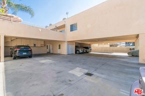 North Hollywood apartment for rent - a parking garage with cars parked in it