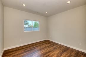 North Hollywood apartment for rent - a living room with wood floors and a window