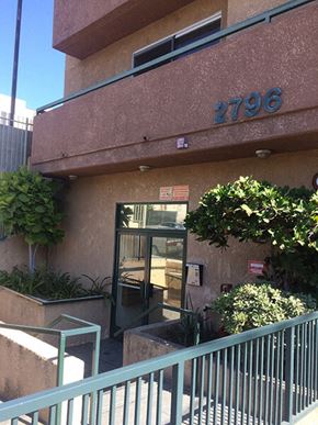 Los Angeles apartment for rent - a building with a glass door and a staircase