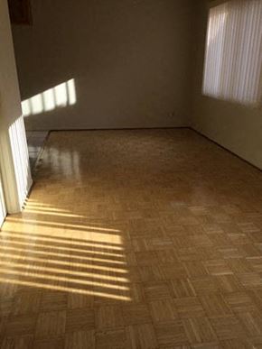 Los Angeles apartment for rent - a living room with a wooden floor and a window
