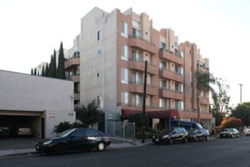 Los Angeles apartment for rent - a building with cars parked in front of it